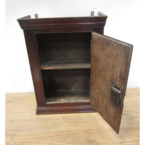 77 - An 18th Century oak single door Wall Cupboard with later back 1ft 9in H x 1ft 3 1/2in W