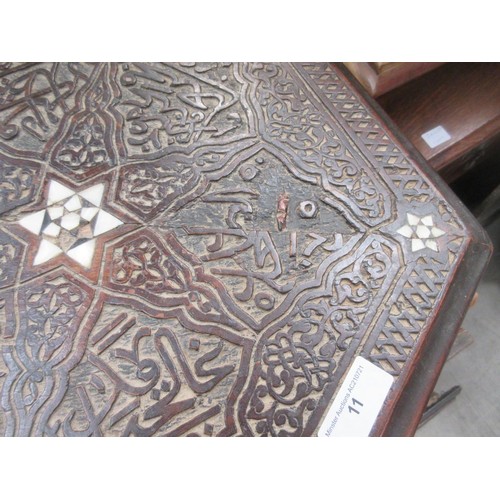 11 - A North African carved hardwood and mother of pearl inlaid hexagonal Table 1ft 10in W x 1ft 9in H