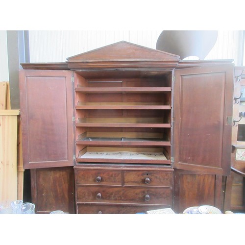 810 - A Victorian mahogany breakfront four door Wardrobe fitted to short and two long drawers to central s... 