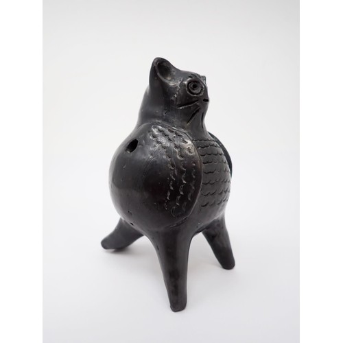 268 - A glazed pottery Owl Caller/Whistle in the form of a stylised owl, 5in H