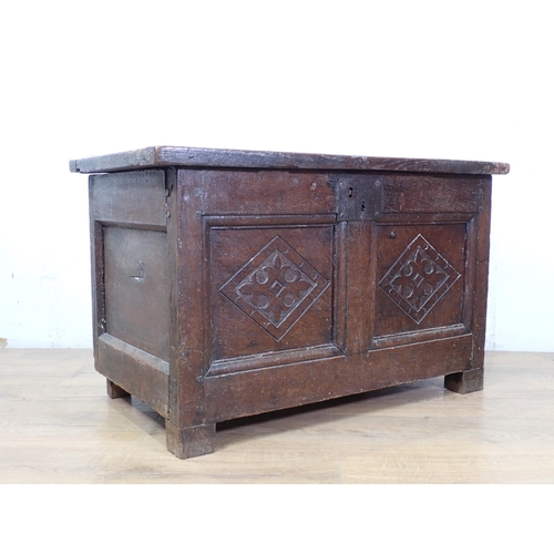 43 - A 17th Century oak Coffer with carved two panel front of small proportions 2ft 6in W x 1ft 7in  A/F