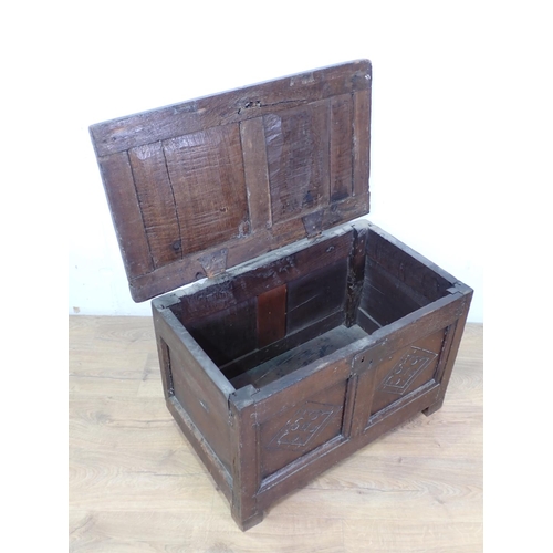 43 - A 17th Century oak Coffer with carved two panel front of small proportions 2ft 6in W x 1ft 7in  A/F