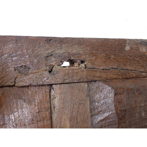 43 - A 17th Century oak Coffer with carved two panel front of small proportions 2ft 6in W x 1ft 7in  A/F