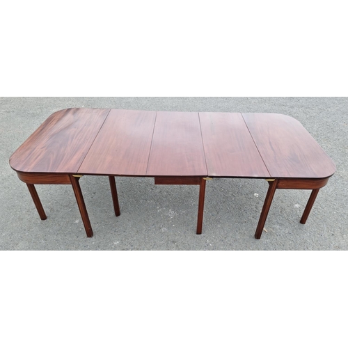 120 - A 19th Century mahogany Dining Table having pair of D-ends, central section with one dropleaf, one s... 