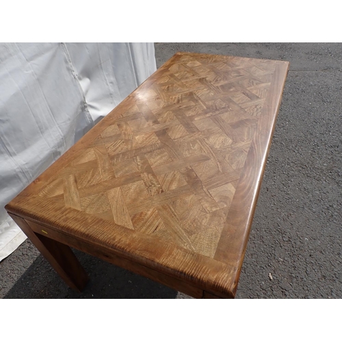 123 - A modern hardwood Dining Table on square cut supports 5ft 9in W x 2ft 6in H and a set of six Dining ... 