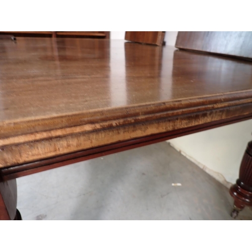 354 - A Victorian mahogany extending Dining Table with two spare leaves on reeded supports 7ft 11in L x 2f... 