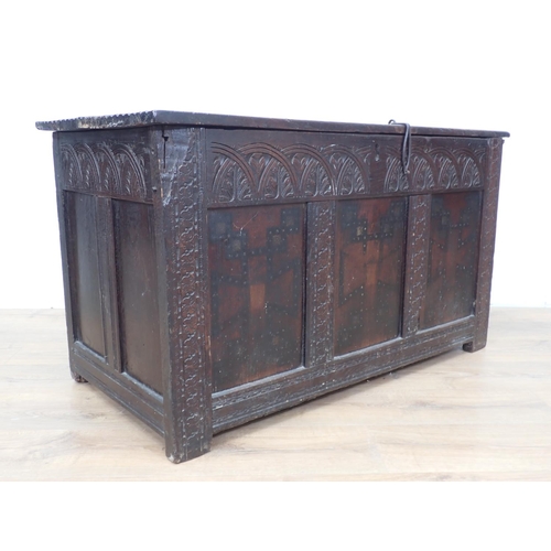 115 - A late 17th or early 18th Century oak three panel Coffer with lunette carved frieze 3ft 10in W x 2ft... 