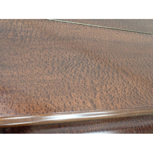 127 - A mahogany cased Baby Grand Piano