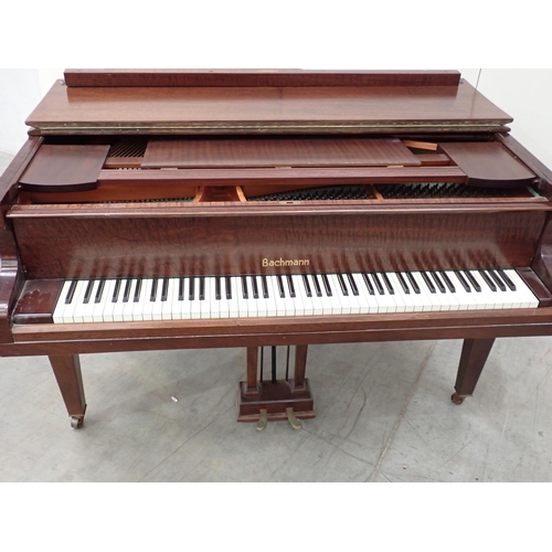 127 - A mahogany cased Baby Grand Piano