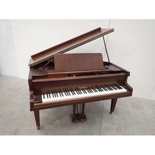 127 - A mahogany cased Baby Grand Piano