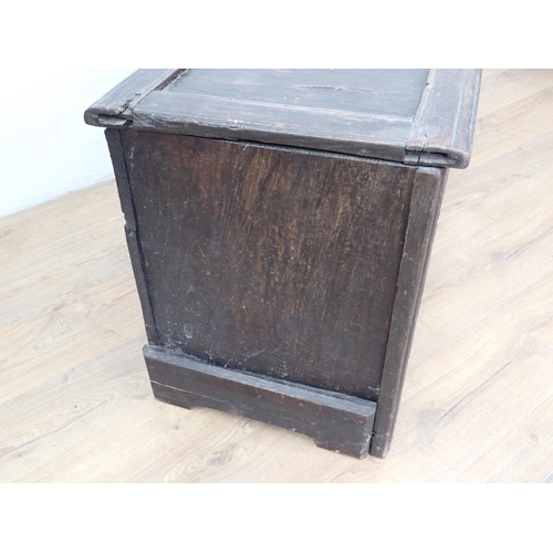 148 - A 17th Century oak Coffer with sunken four panel lid above carved front 3ft 11in W x 1ft 9in H