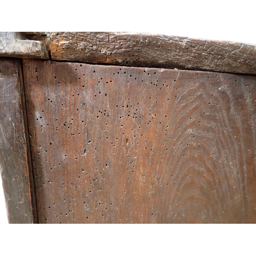 148 - A 17th Century oak Coffer with sunken four panel lid above carved front 3ft 11in W x 1ft 9in H