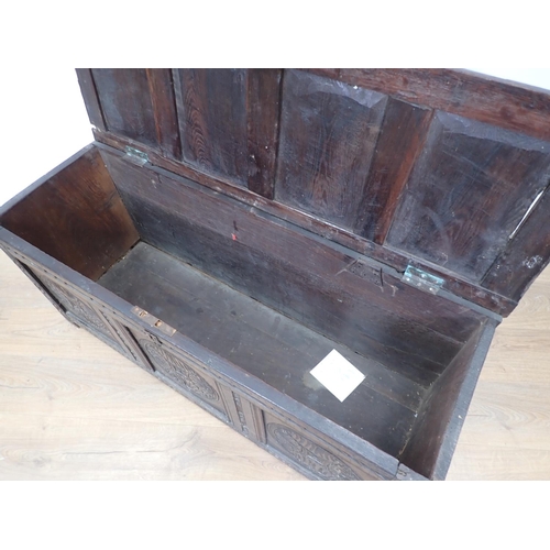 148 - A 17th Century oak Coffer with sunken four panel lid above carved front 3ft 11in W x 1ft 9in H