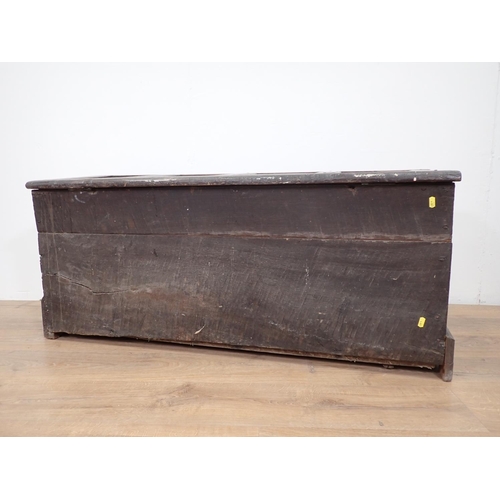 148 - A 17th Century oak Coffer with sunken four panel lid above carved front 3ft 11in W x 1ft 9in H