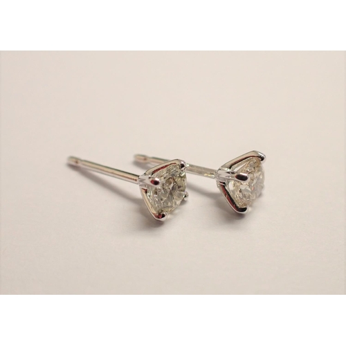 177 - A pair of Diamond Ear Studs each claw-set brilliant-cut stone, total diamond weight 0.80cts, in 18ct... 