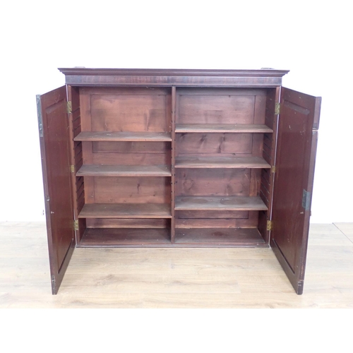 20 - A Georgian mahogany hanging Cupboard the pair of doors enclosing shelves 3ft 11in W x 3ft 4in H