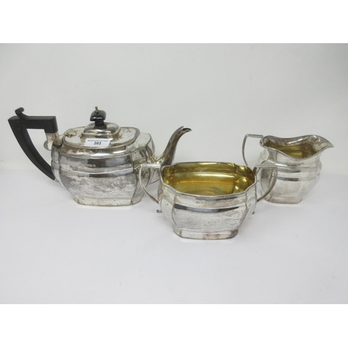 202 - A George V silver three piece Tea Service of boat shape, Birmingham 1929, 984 gms all in