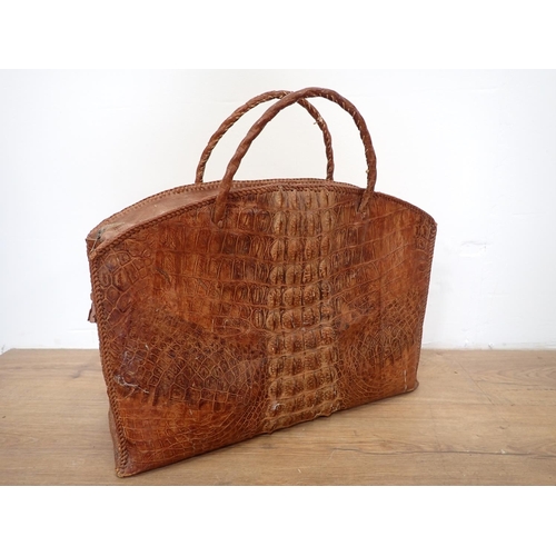 21 - A crocodile skin Hand Bag and a snakeskin Purse