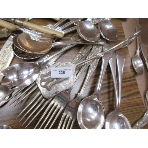 236 - Two silver Sugar Tongs, two plated Tongs, plated three piece Condiment Set, Magnifying Glass and a l... 