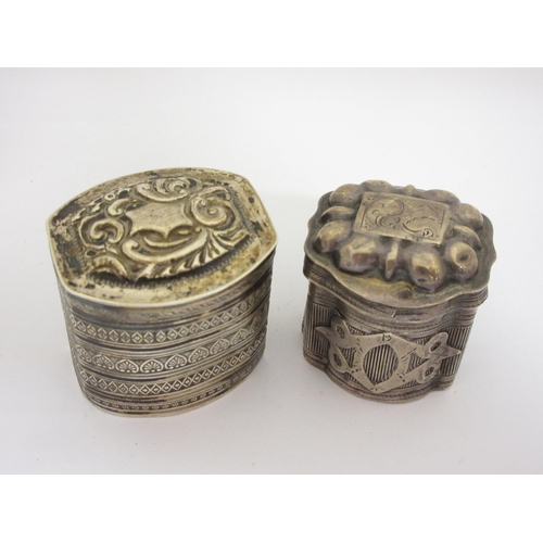 254 - Two Continental silver Cashew Boxes with hinged lids, both worn