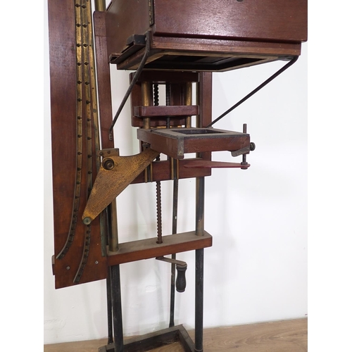 345 - An Edwardian Camera on mahogany and brass stand