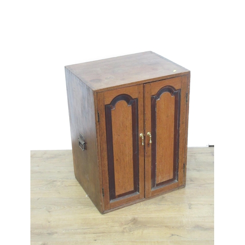 348 - A 19th Century teak two door Cupboard fitted pair of arched fielded doors 2ft 5in H x 1ft 10in W