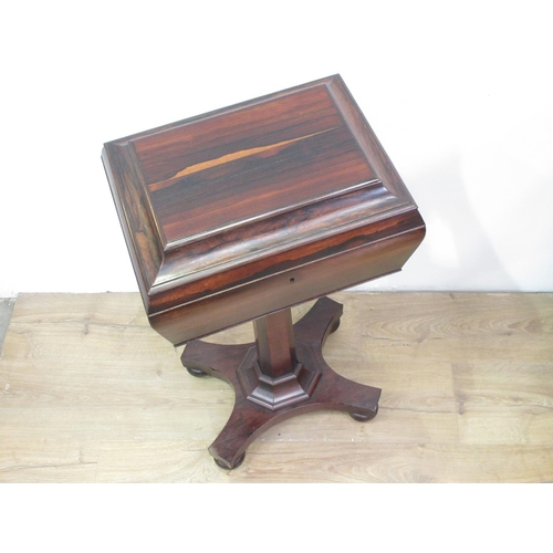 387 - A 19th Century rosewood veneered Teapoy fitted two internal compartments and two cut glass mixing bo... 