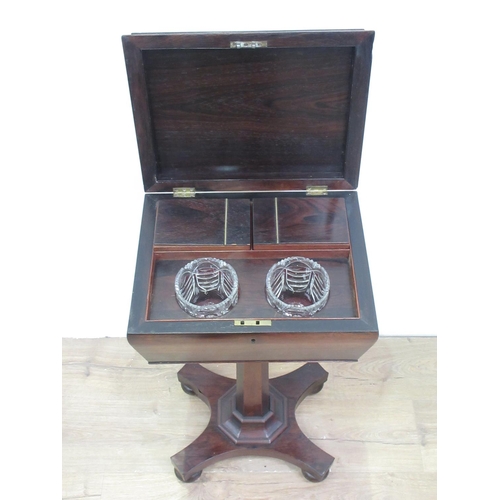 387 - A 19th Century rosewood veneered Teapoy fitted two internal compartments and two cut glass mixing bo... 