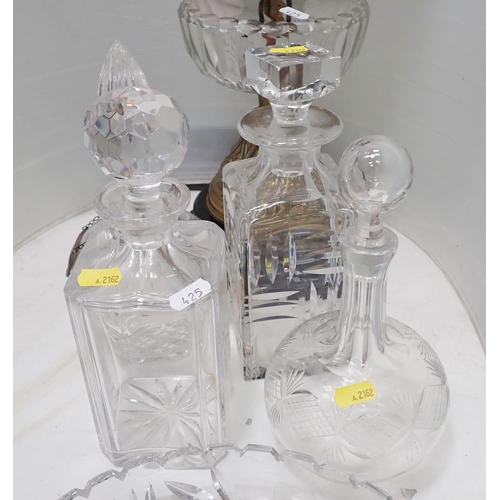 425 - A Victorian Oil Lamp with etched glass shade, four Decanters and a shallow Bowl