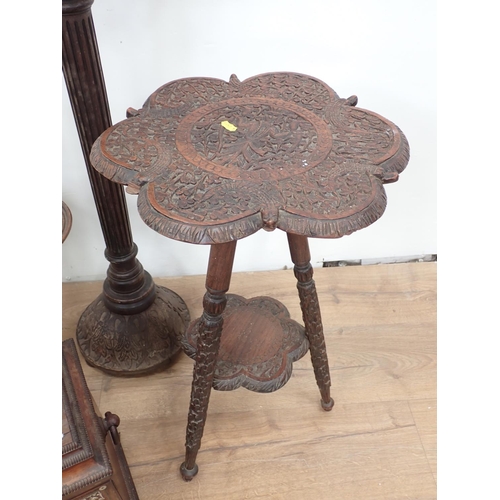 493 - A 19th Century rosewood veneered and mother of pearl inlaid table top Cabinet, the pair of cupboard ... 