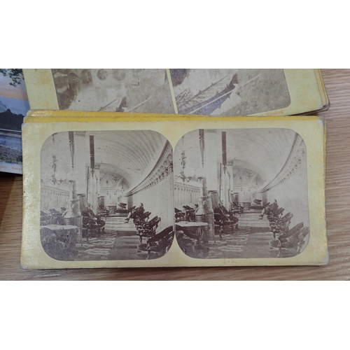 502 - A hand held Stereoscopic Viewer (no lenses) and a quantity of slides, and Postcards