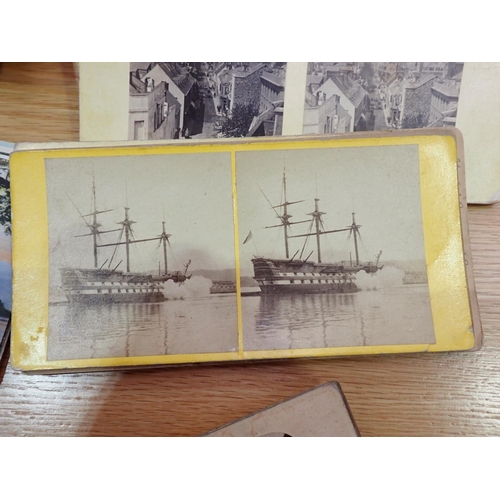 502 - A hand held Stereoscopic Viewer (no lenses) and a quantity of slides, and Postcards