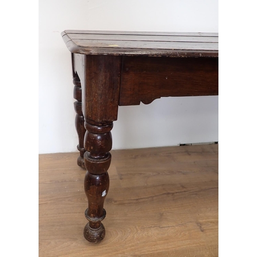 518 - A late 19th Century Welsh Table with rectangular top, baluster turned supports and detail to the fri... 