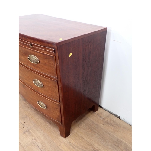 522 - A 19th Century mahogany bowfront Chest fitted brushing slide above three long drawers on bracket sup... 