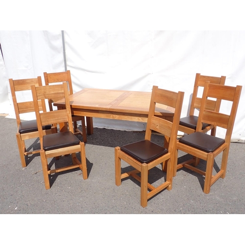 537A - A modern ash extending Dining Table and six Chairs with squared supports made by Halo Plum, 5ft L ex... 