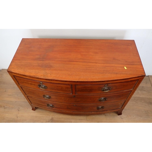 558 - A 19th Century mahogany and inlaid bow fronted Chest of two short and three long drawers on splayed ... 