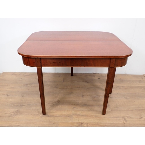 563 - A 19th Century mahogany and inlaid fold over Tea Table on square cut supports 3ft 8in W x 2ft 5in H