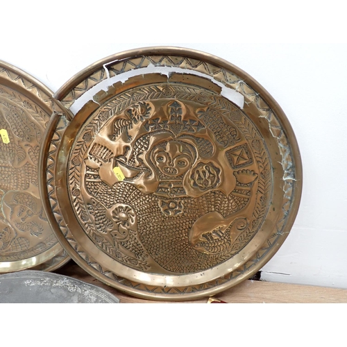 566 - Two copper Chargers, pewter Charger, Barometer and a Clock/Barometer