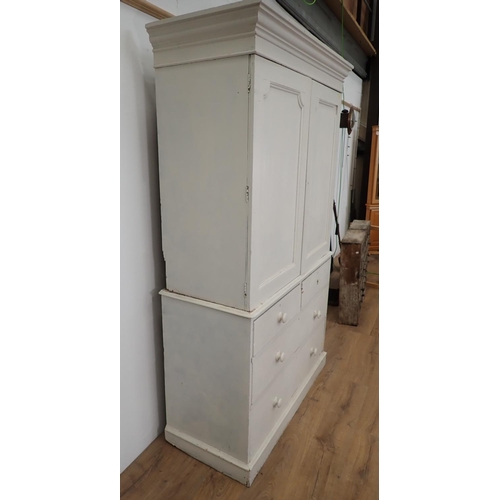 623 - A 19th Century white painted pine Linen Press the base fitted two short and two long drawers 6ft 11i... 