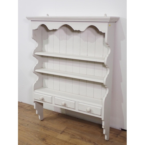 625 - A white painted pine Plate Rack fitted three drawers 3ft 8in H x 2ft 10in W