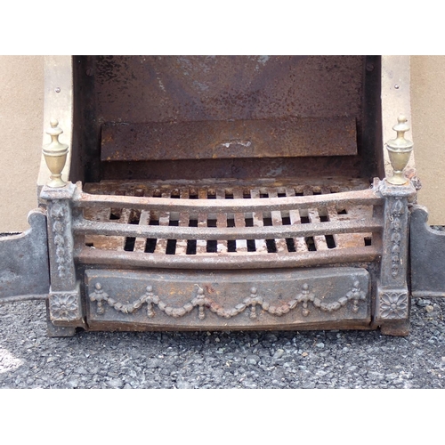 656 - A cast iron and brass mounted Fire Place