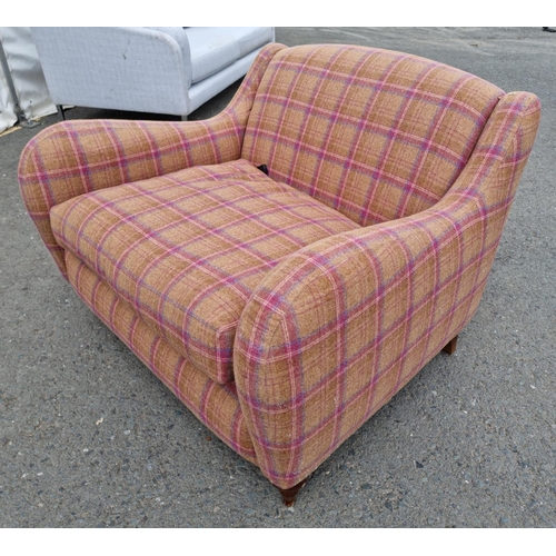 669 - A tartan upholstered modern two seater Sofa on turned pine front supports 3ft 8in W x 2ft 7in H