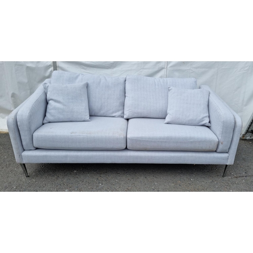 671 - A modern blue upholstered Sofa on polished metal supports 6ft 9in W x 2ft 1in H