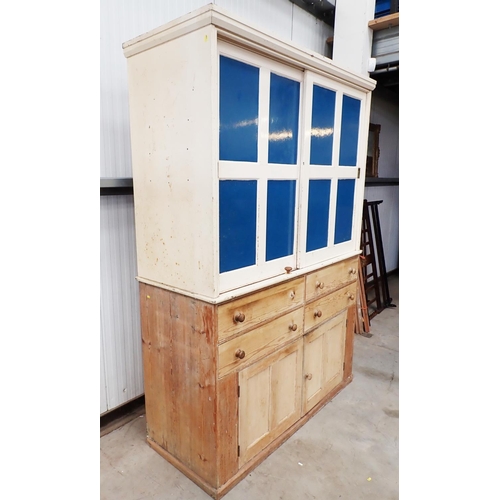 9 - A Victorian pine Housekeeper's Cupboard the upper painted section fitted two sliding doors above bas... 