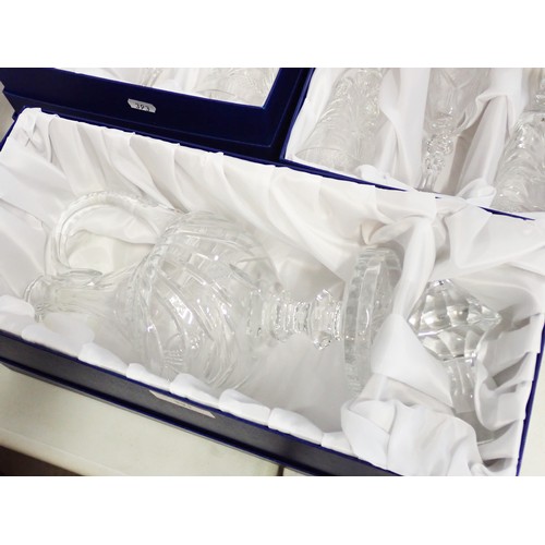 393 - A boxed Veritable Crystal Ewer and two boxed sets of Glasses