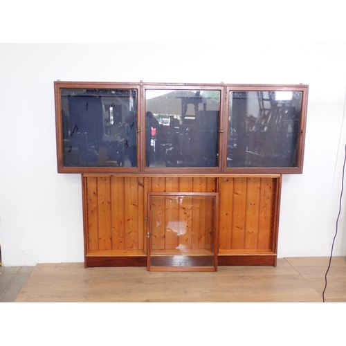 7 - A glazed walnut three door Chemist's Shop Fitting Wall Cabinet, labelled George Cook 7ft 3in L x 2ft... 