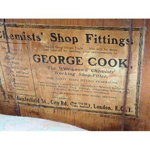 7 - A glazed walnut three door Chemist's Shop Fitting Wall Cabinet, labelled George Cook 7ft 3in L x 2ft... 