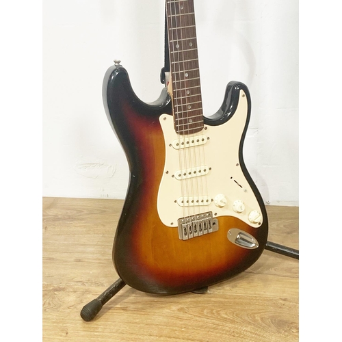 34 - A Jim Haxley electric Guitar and a Park by Marshall Amplifier (passed PAT test)