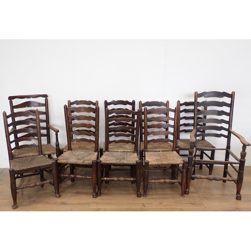 59 - A matched set of ten antique rush seated ladderback Chairs