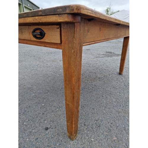 109 - A Victorian pine Farmhouse Table fitted drawer to each end mounted upon square cut tapering supports... 